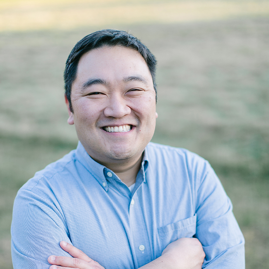 Smiling Andy with blurred background