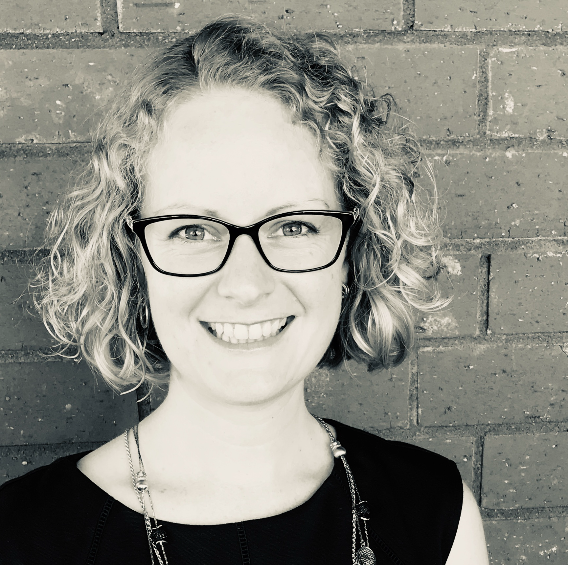 smiling woman with glasses