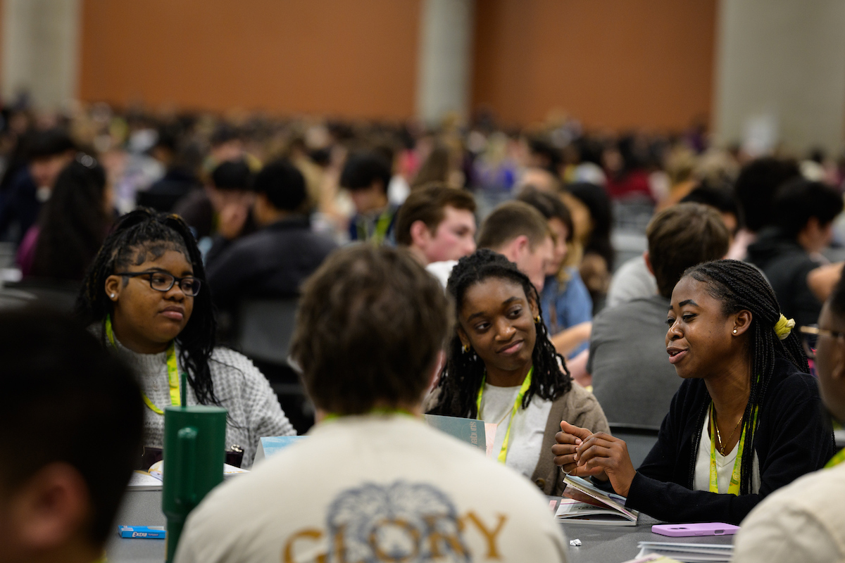 Students engage with each other during Bible study on Jonah.