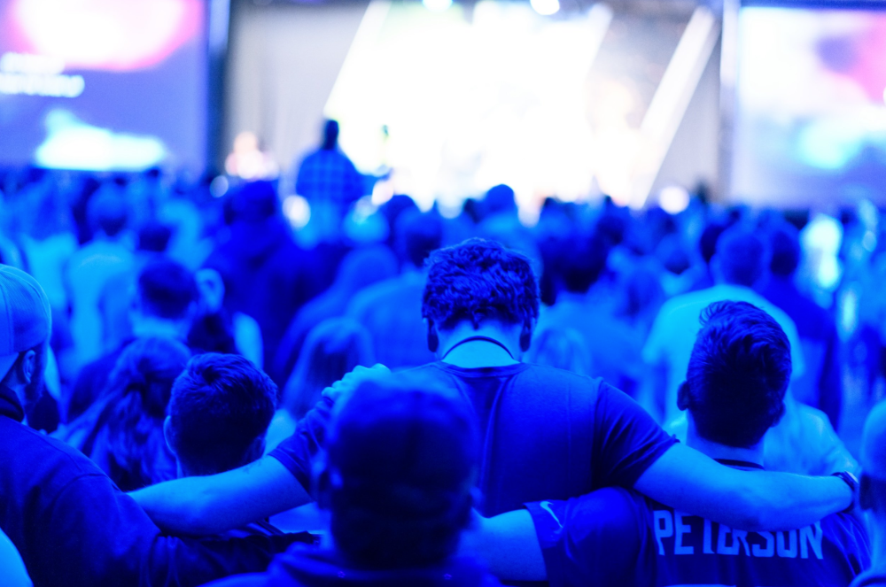 group photo of students worshipping