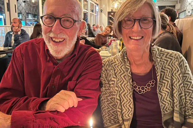 Man (Len) and his wife (Mary) sit next to each other